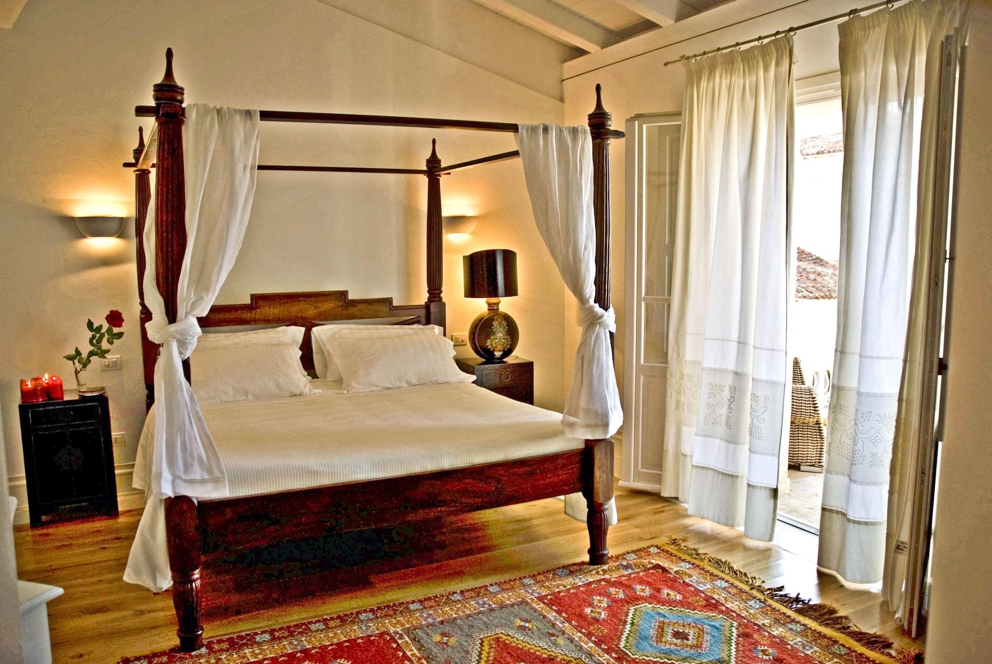 Tartheshotel Guspini Esterno foto