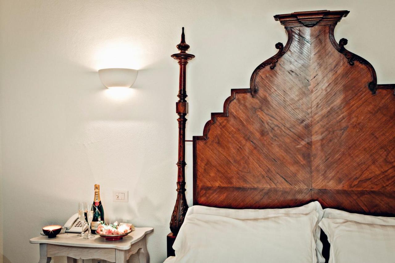 Tartheshotel Guspini Esterno foto